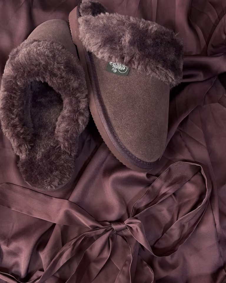The Elysian in Blood Moon, deep burgundy shearling slippers on wine satin